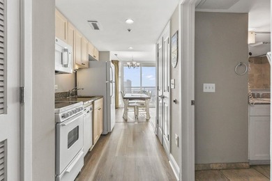 Welcome to this beautifully updated, fully furnished top-floor - photo 2