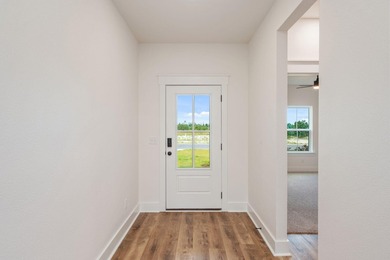 New construction 3BR/2BA home in Game Farm subdivision featuring - photo 5
