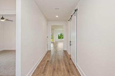 New construction 3BR/2BA home in Game Farm subdivision featuring - photo 6
