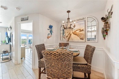 BEACHFRONT BEAUTY! Fabulously updated, this spacious 3-bedroom - photo 11