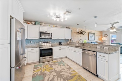 BEACHFRONT BEAUTY! Fabulously updated, this spacious 3-bedroom - photo 12