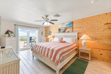 BEACHFRONT BEAUTY! Fabulously updated, this spacious 3-bedroom - photo 19