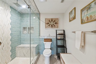 BEACHFRONT BEAUTY! Fabulously updated, this spacious 3-bedroom - photo 22