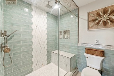 BEACHFRONT BEAUTY! Fabulously updated, this spacious 3-bedroom - photo 23