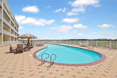 BEACHFRONT BEAUTY! Fabulously updated, this spacious 3-bedroom - photo 30