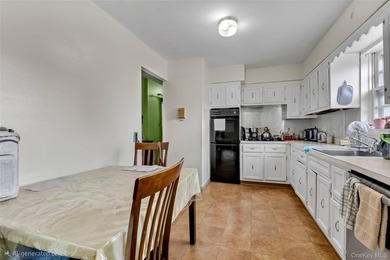 36-11 Utopia Parkway is a detached brick legal 2-family home - photo 11