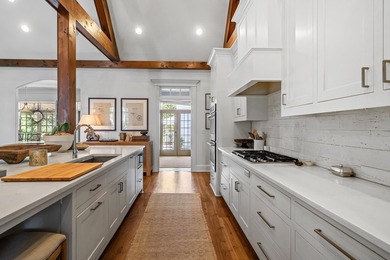 Beautiful custom home in The Coves at Cuscowilla, offering - photo 17