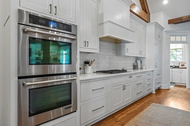 Beautiful custom home in The Coves at Cuscowilla, offering - photo 20