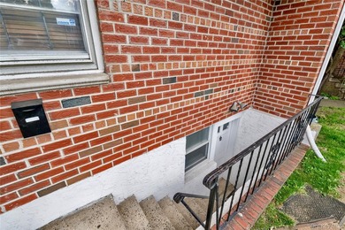 36-11 Utopia Parkway is a detached brick legal 2-family home - photo 21