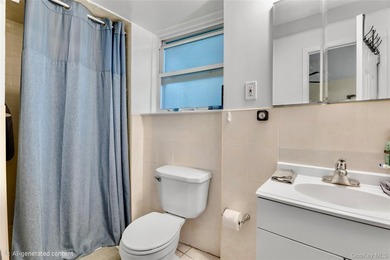 36-11 Utopia Parkway is a detached brick legal 2-family home - photo 24