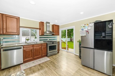 Welcome to this beautiful expanded cape located in Islip. This - photo 6