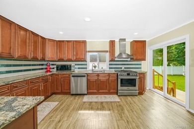 Welcome to this beautiful expanded cape located in Islip. This - photo 7