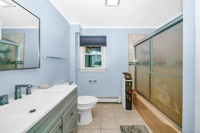 Welcome to this beautiful expanded cape located in Islip. This - photo 10