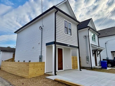 CUSTOM NEW CONSTRUCTION on an up and coming area with many new - photo 1