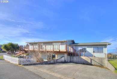 Experience coastal living at its finest in this beautifully - photo 1