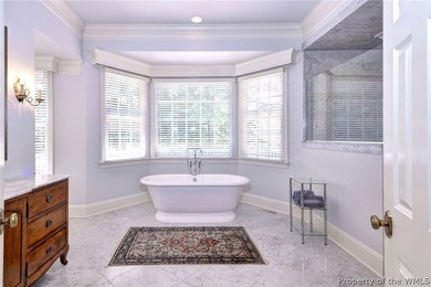 Enjoy gracious living in this stately golf-front brick home in - photo 14