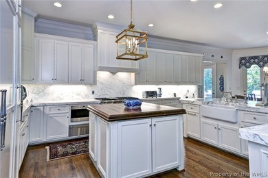 Enjoy gracious living in this stately golf-front brick home in - photo 20