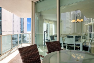 Enjoy elevated coastal living on prestigious Collins Avenue in