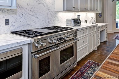 Enjoy gracious living in this stately golf-front brick home in - photo 21