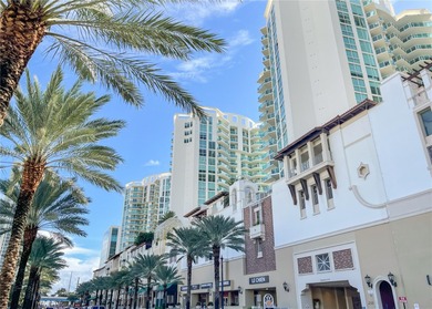 Enjoy elevated coastal living on prestigious Collins Avenue in