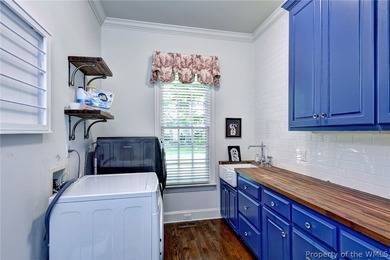 Enjoy gracious living in this stately golf-front brick home in - photo 24