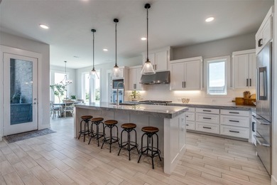 Motivated seller. Exquisitely crafted by Gutman Custom Homes and - photo 3