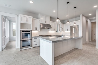 Motivated seller. Exquisitely crafted by Gutman Custom Homes and - photo 5
