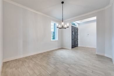 Motivated seller. Exquisitely crafted by Gutman Custom Homes and - photo 10