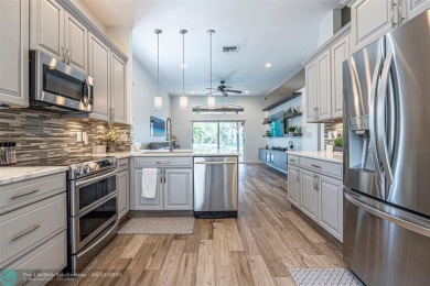 Lake Home For Sale in Coconut Creek, Florida