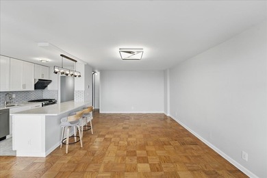 Enjoy a seamless flow betwwen the newly renovated, open -