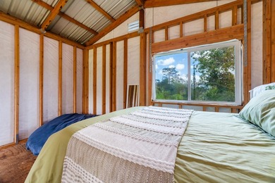 This exceptional fully fenced 9.16-acre homestead offers a - photo 22