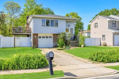 Welcome to 16 E Grove Street in Massapequa - a spacious and - photo 3