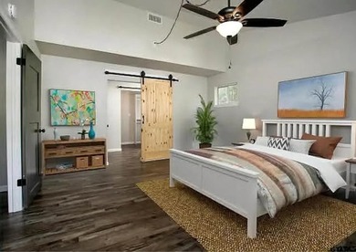 Charming 3-bedroom, 2-bath home in the gated Hide A Way Lake - photo 6