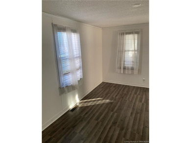 Charming Corner-Lot Bungalow with Modern Updates, Brand New Roof