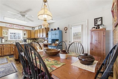 Tucked away on nearly an acre of serene, wooded land with - photo 17