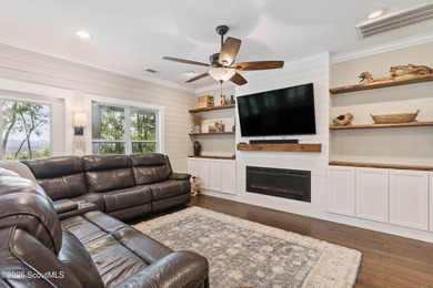 Welcome to this stunning custom-built marsh front home in the - photo 20