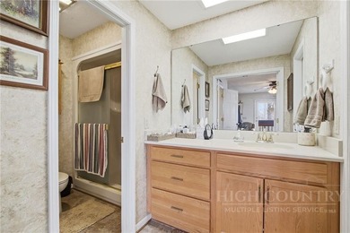 Tucked away on nearly an acre of serene, wooded land with - photo 22
