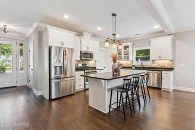 Welcome to this stunning custom-built marsh front home in the - photo 23