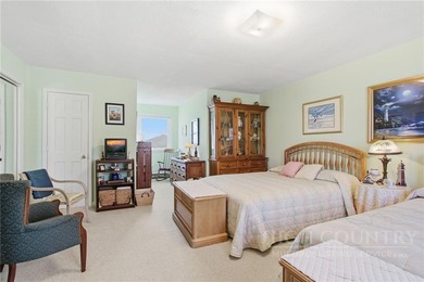 Tucked away on nearly an acre of serene, wooded land with - photo 23