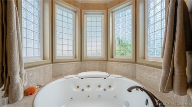 In The Villages at Shawnee Bend, this Lakefront estate blends - photo 24
