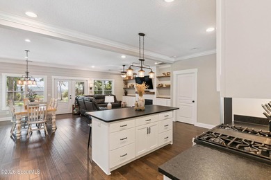 Welcome to this stunning custom-built marsh front home in the - photo 27