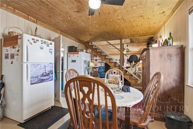 Tucked away on nearly an acre of serene, wooded land with - photo 30