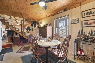 Tucked away on nearly an acre of serene, wooded land with - photo 31