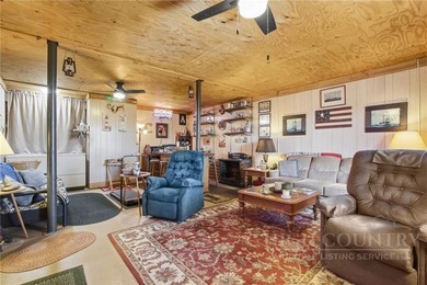 Tucked away on nearly an acre of serene, wooded land with - photo 34