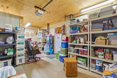 Tucked away on nearly an acre of serene, wooded land with - photo 36