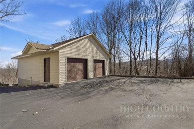 Tucked away on nearly an acre of serene, wooded land with - photo 40