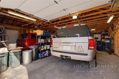 Tucked away on nearly an acre of serene, wooded land with - photo 41
