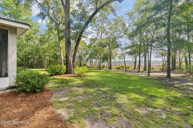 Welcome to this stunning custom-built marsh front home in the - photo 44