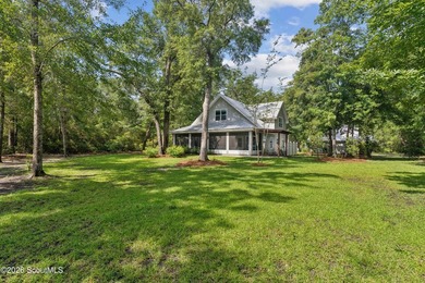 Welcome to this stunning custom-built marsh front home in the - photo 47