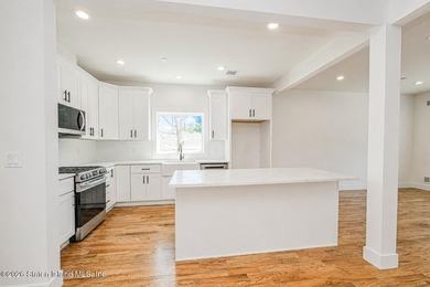 An exceptional extra large new construction 6/6 two-family semi - photo 12